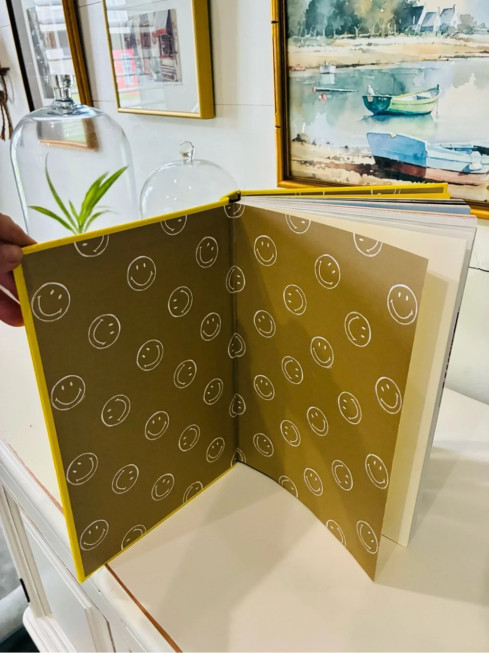 ✨ Brighten up your home with this stunning, vibrant yellow Assouline pop-culture